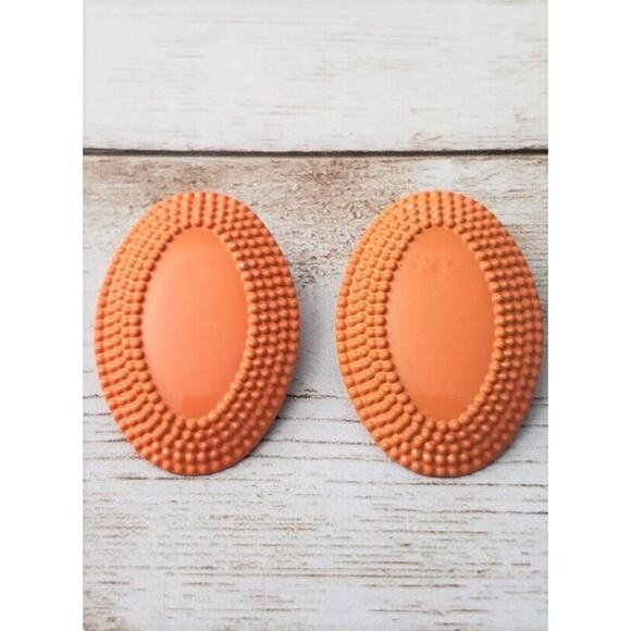 Vintage Clip On Earrings Orange Metal Oval Just Over 1 & 1/8" - Picture 1 of 4